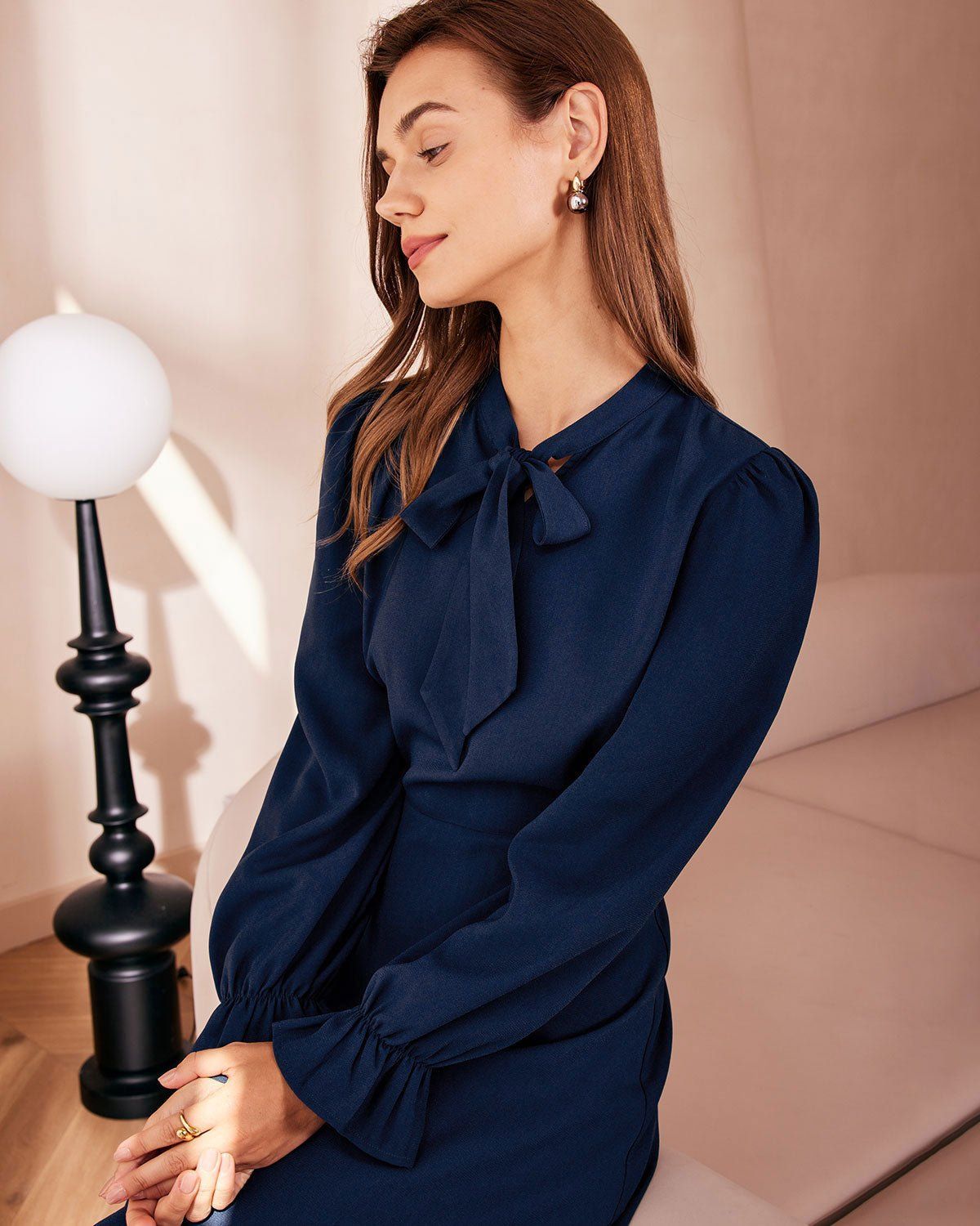 The Navy Mock Neck Ruffle Cutout Mini Dress sold by rihoas product image thumbnail 4