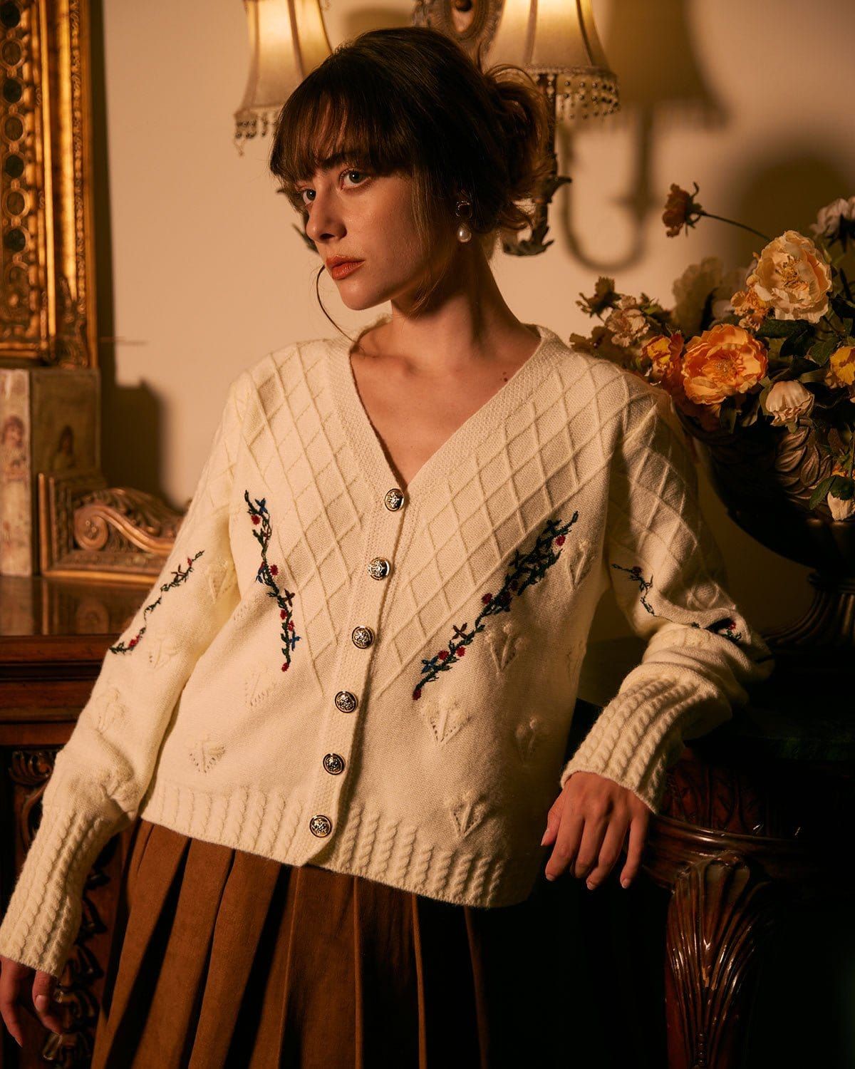 The White V Neck Floral Embroidery Cardigan sold by rihoas