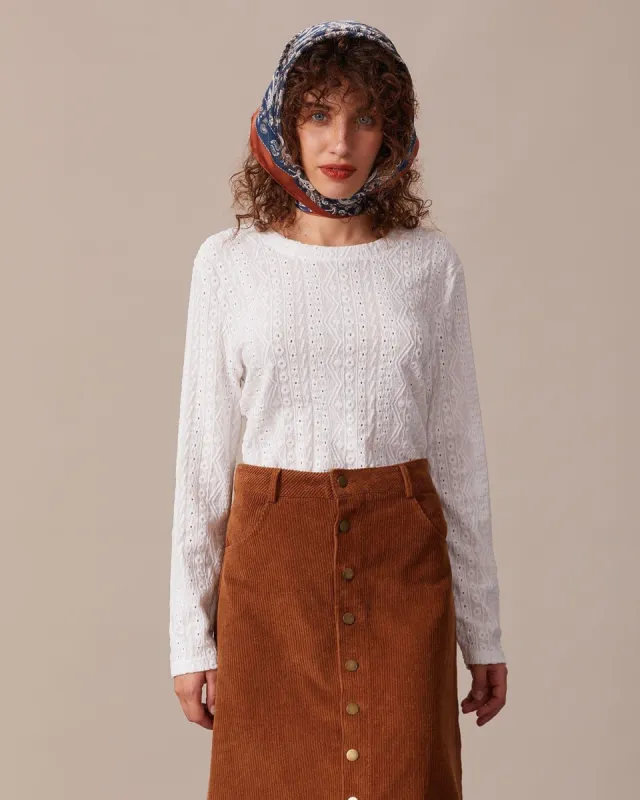 The White Round Neck Eyelet Embroidery Tee sold by rihoas