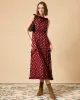 The Polka Dot Sleeveless Slit Midi Dress sold by rihoas