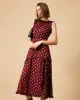 The Polka Dot Sleeveless Slit Midi Dress sold by rihoas