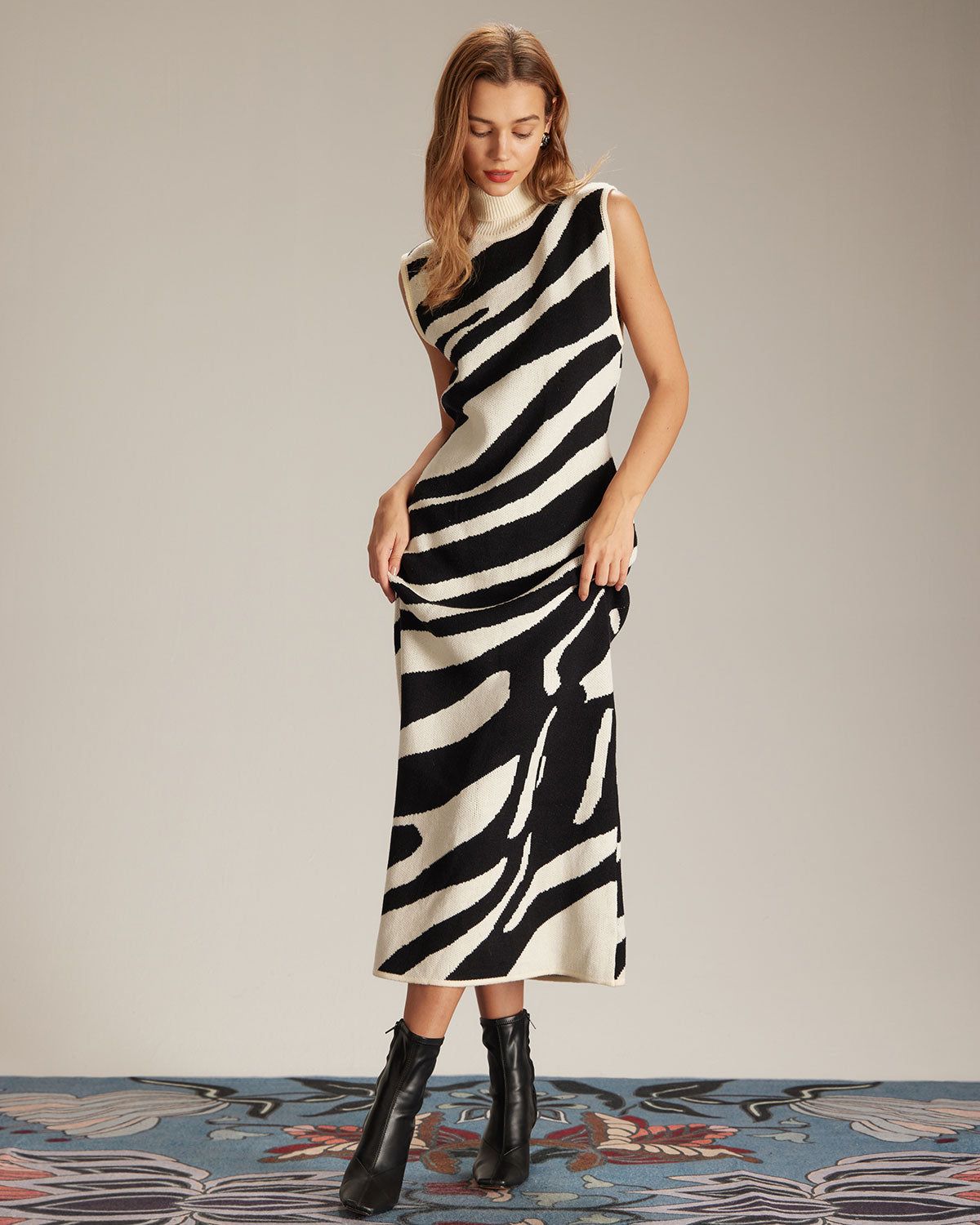 The Black Mock Neck Tank Sweater Midi Dress sold by rihoas