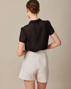 The Black Lapel Lace Trim Pleated Blouse sold by rihoas