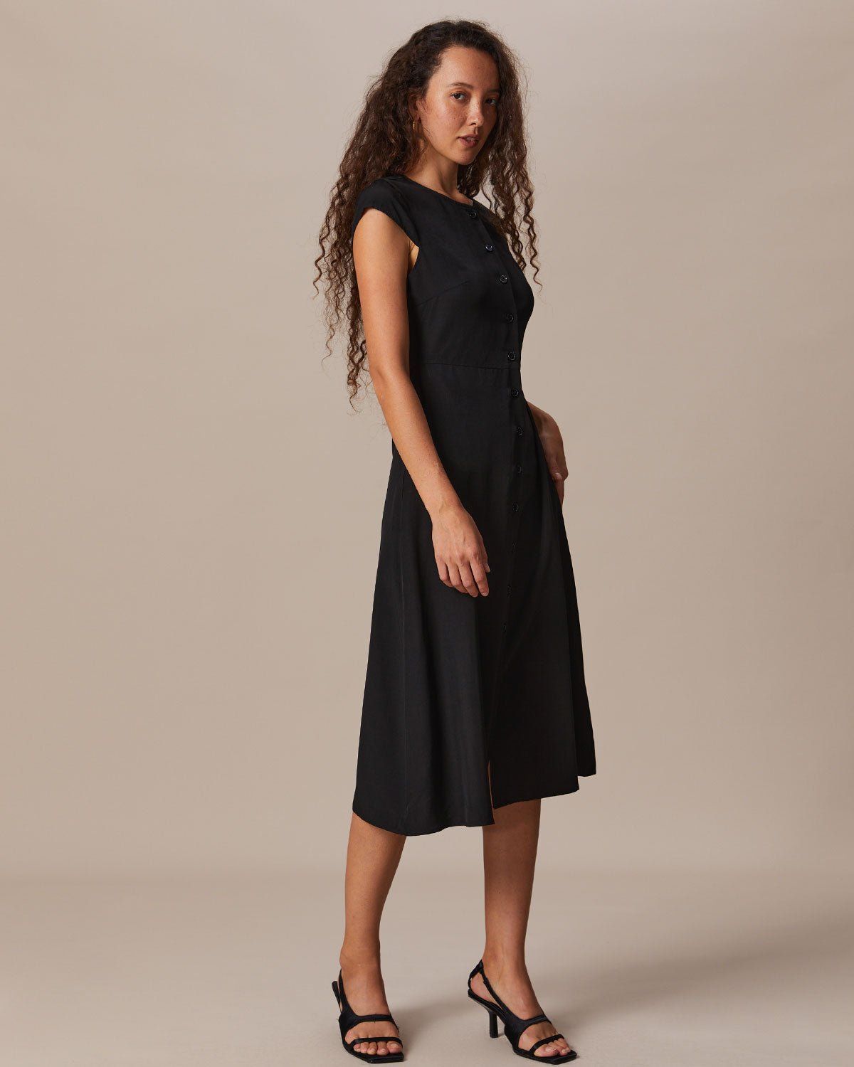 The Black Round Neck Cap Sleeve Midi Dress sold by rihoas product image thumbnail 3