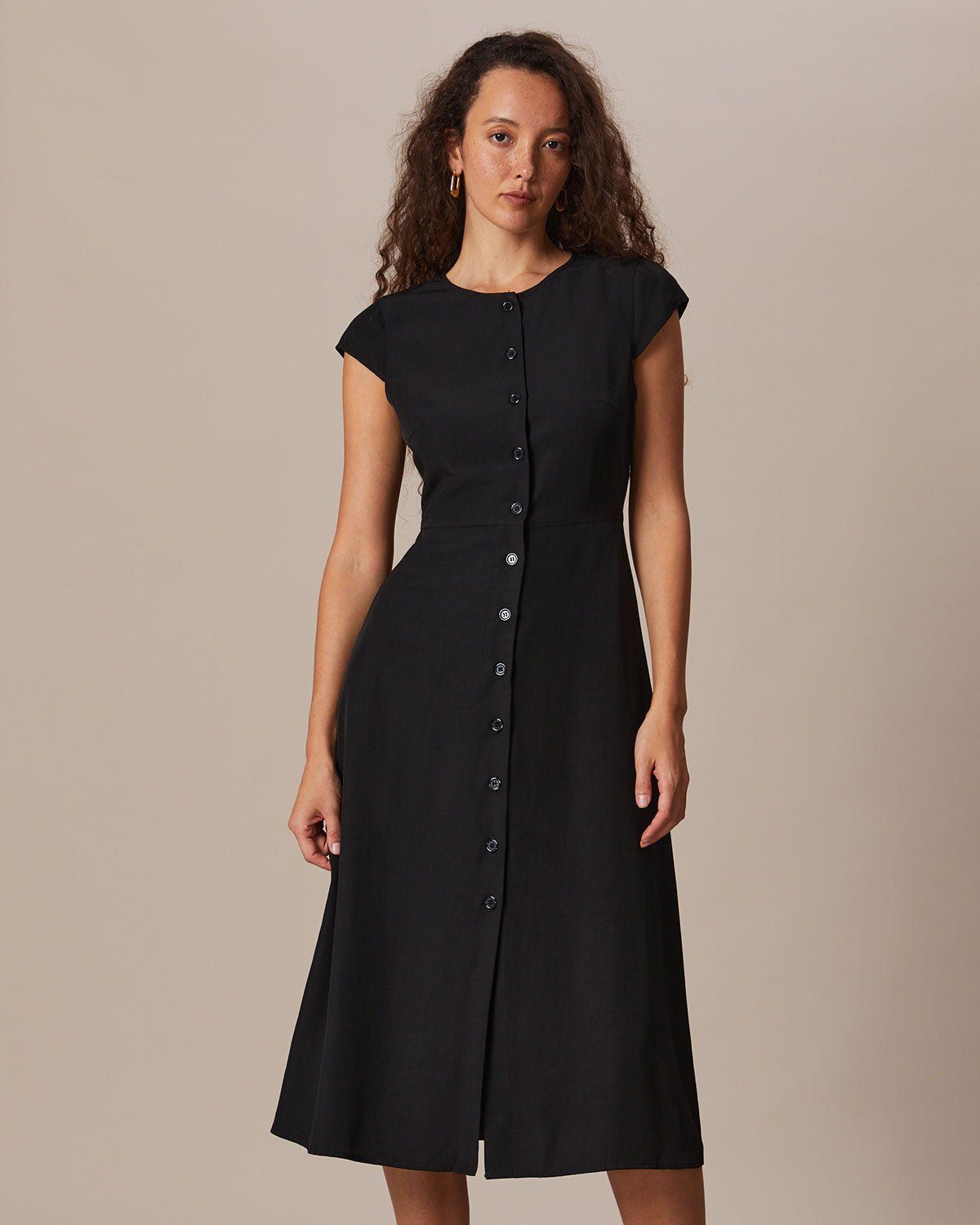 The Black Round Neck Cap Sleeve Midi Dress sold by rihoas