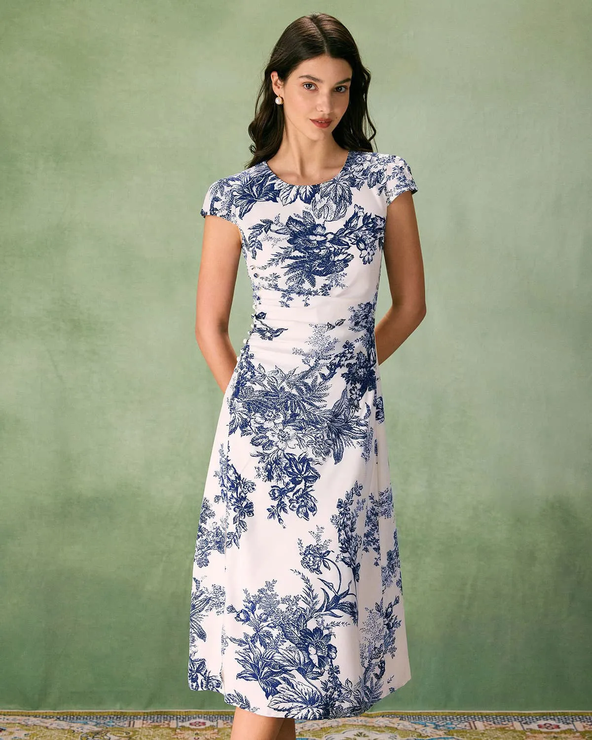 The Round Neck Cap Sleeve Floral Midi Dress sold by rihoas
