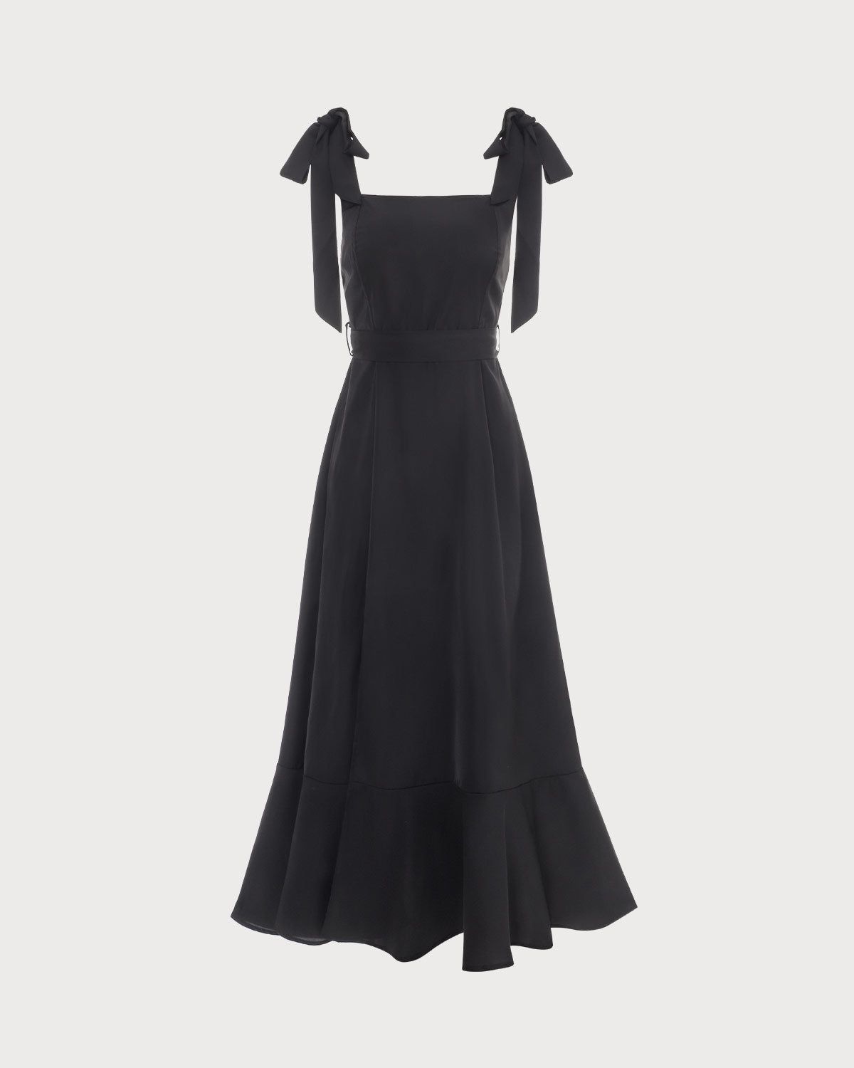 The Black Ruffle Hem Tie Strap Maxi Dress sold by rihoas
