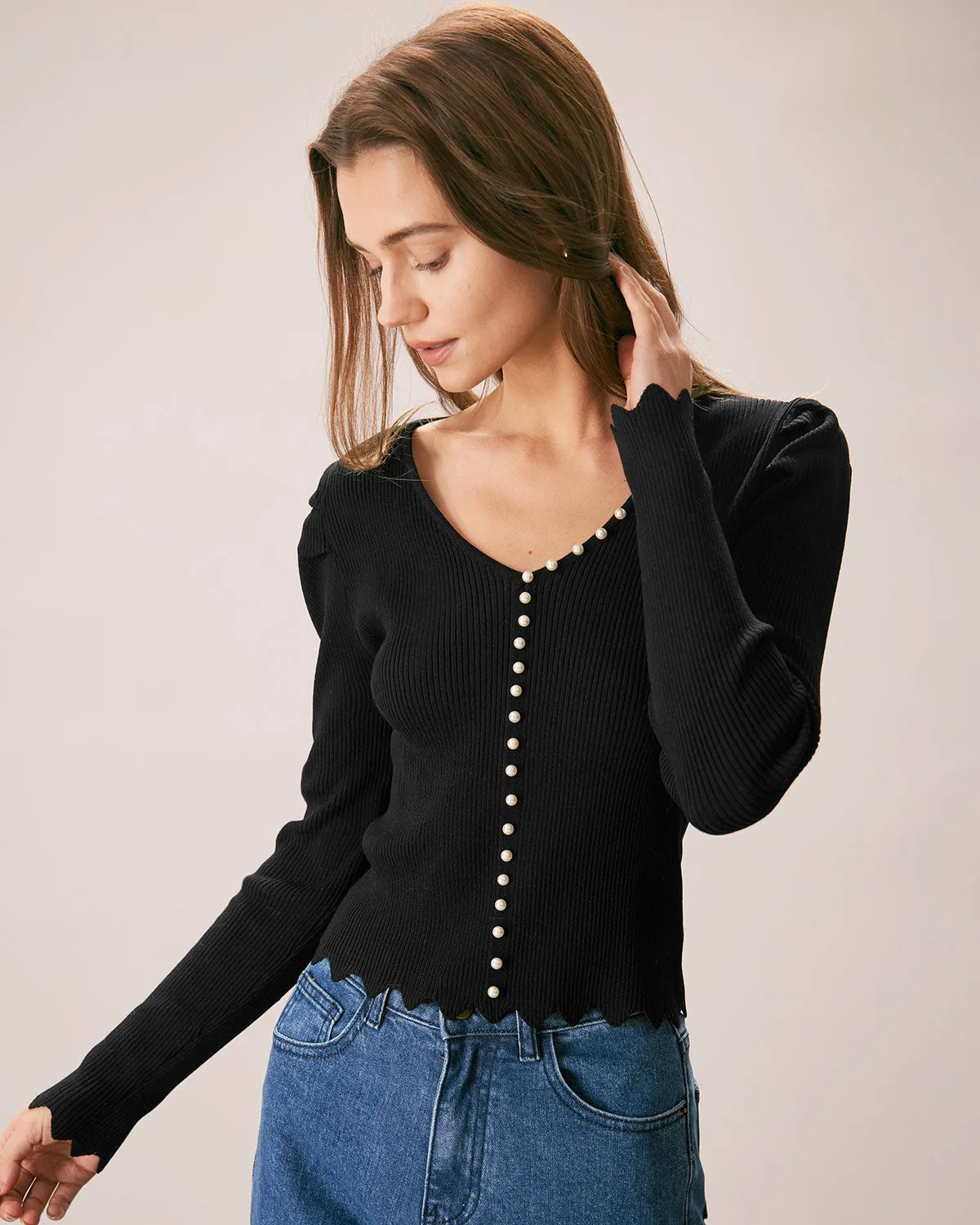 The Black V Neck Pearl Button Knit Top sold by rihoas