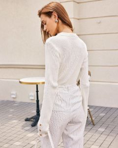 The White Lapel Pointelle Button Knit Top sold by rihoas
