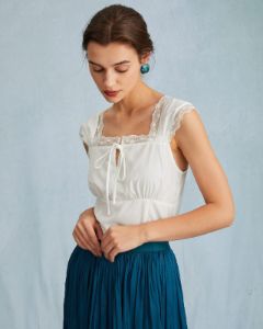 The White Sleeveless Ruched Lace Trim Tank Top sold by rihoas