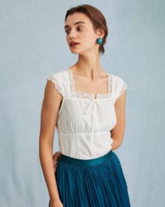 The White Sleeveless Ruched Lace Trim Tank Top sold by rihoas