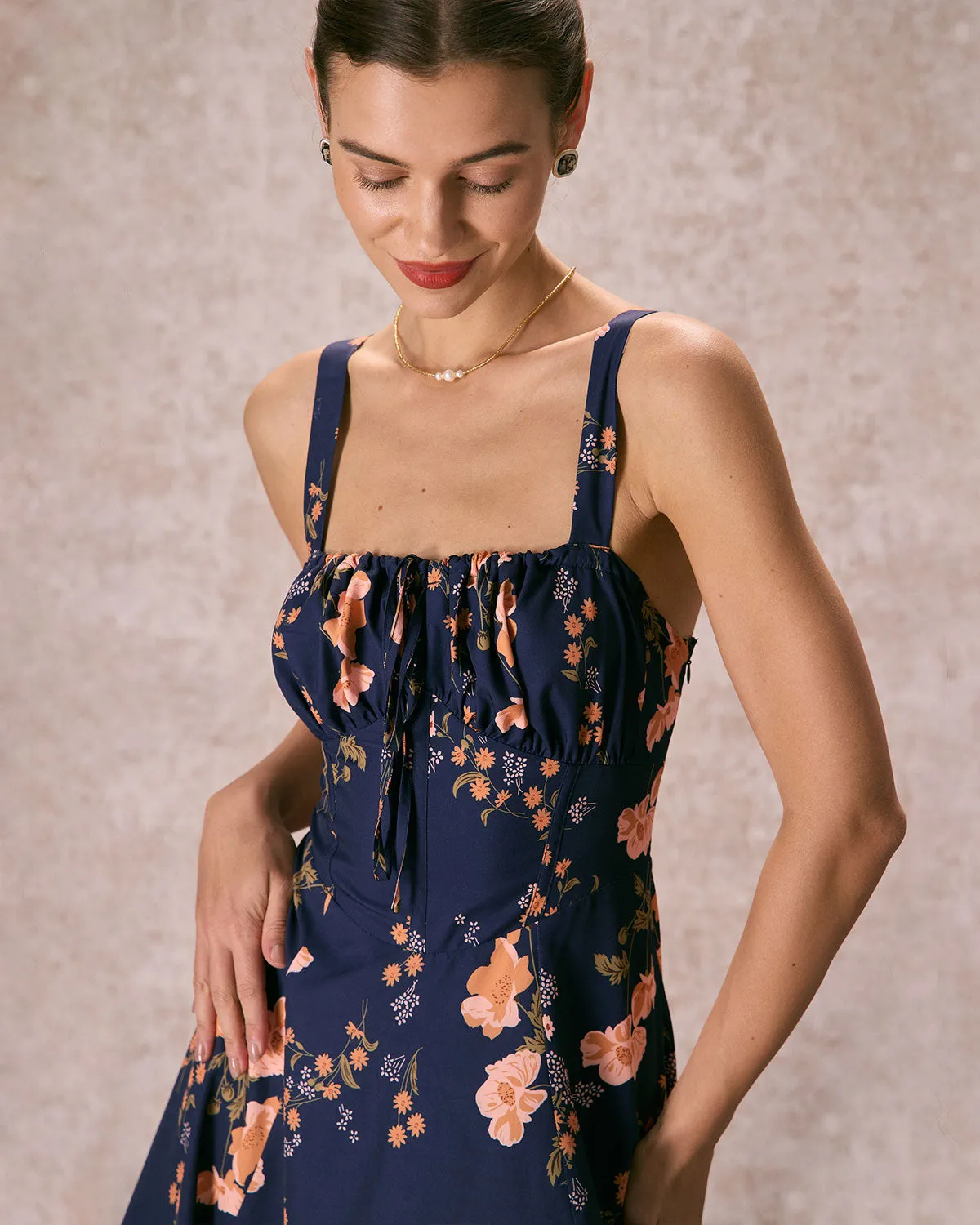 The Navy Lace Up Floral Ruched Midi Dress sold by rihoas product image thumbnail 2