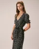 The Black V Neck Floral Puff Sleeve Maxi Dress sold by rihoas