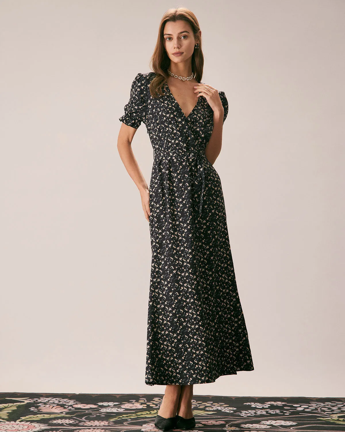 The Black V Neck Floral Puff Sleeve Maxi Dress sold by rihoas