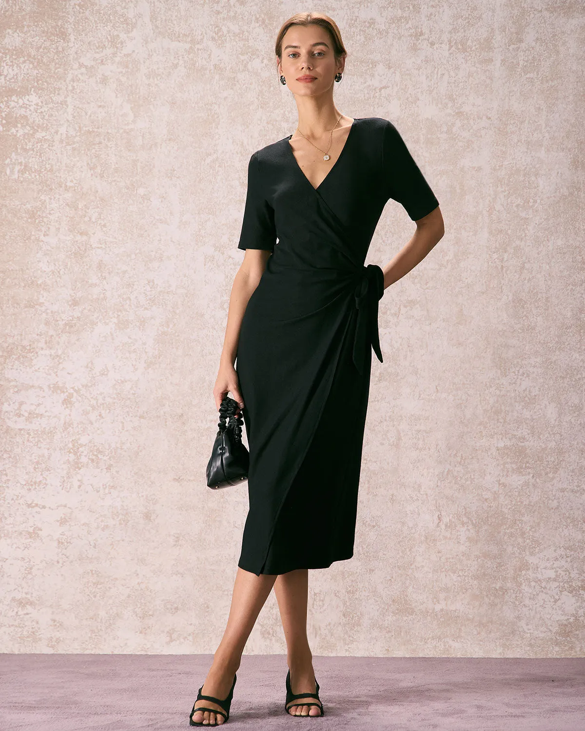 The Black V Neck Tie Waist Wrap Midi Dress sold by rihoas