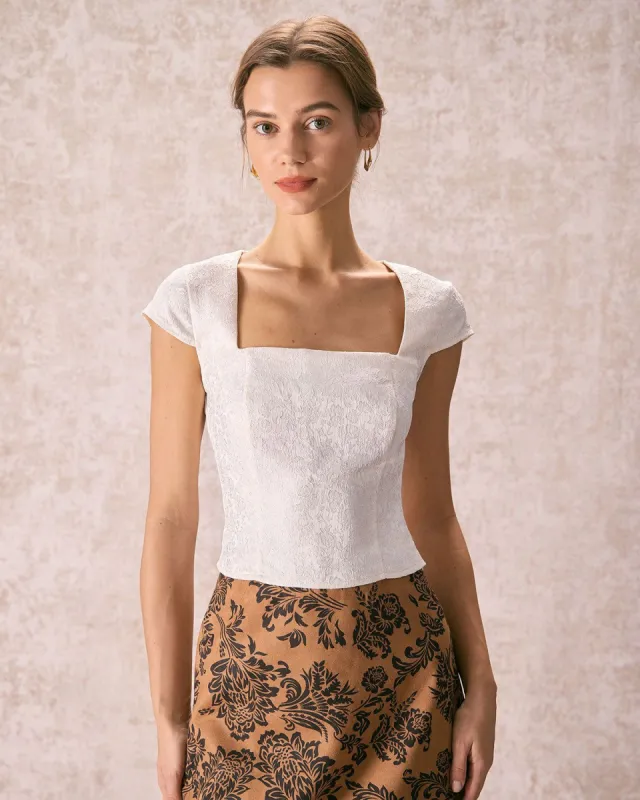 The Beige Square Neck Cutout Jacquard Blouse sold by rihoas