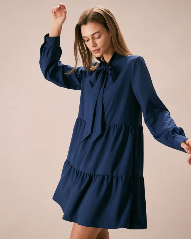 The Blue Tie-Neck Tiered Babydoll Mini Dress sold by rihoas