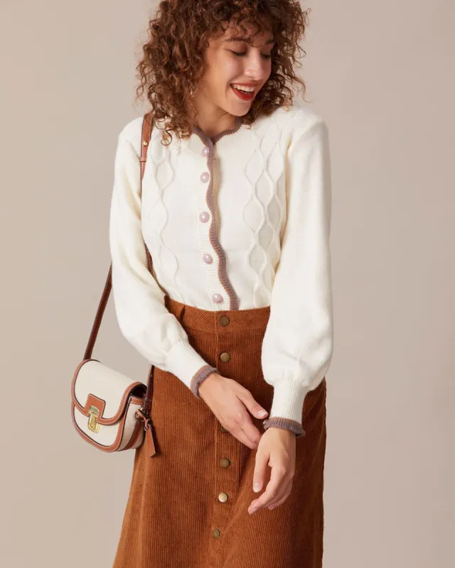The Beige Contrast Trim Scalloped Cardigan sold by rihoas
