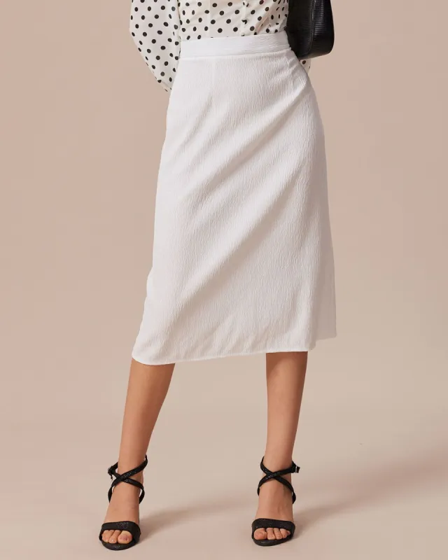 The White Textured Crepe Ruched Midi Skirt sold by rihoas