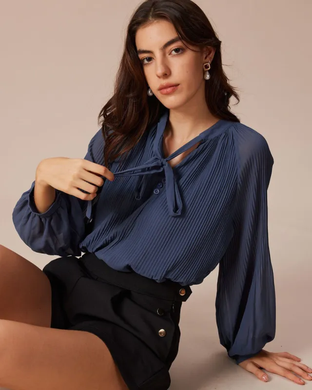 The Blue V Neck Pleated Lantern Sleeve Shirt sold by rihoas