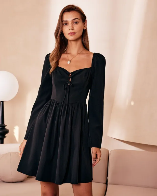 The Black Pleated Cutout Criss-Cross Mini Dress sold by rihoas