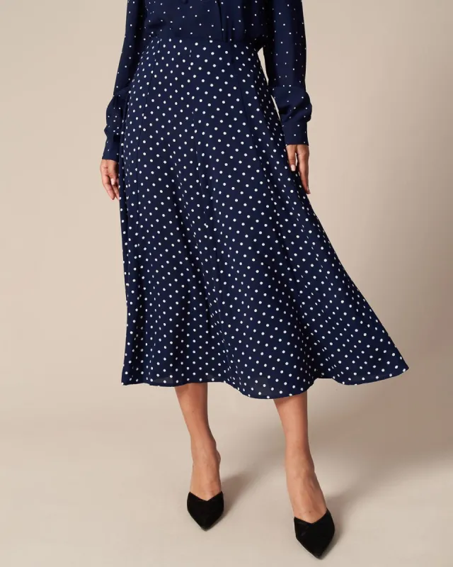 The Navy High Waisted Polka Dot Midi Skirt sold by rihoas