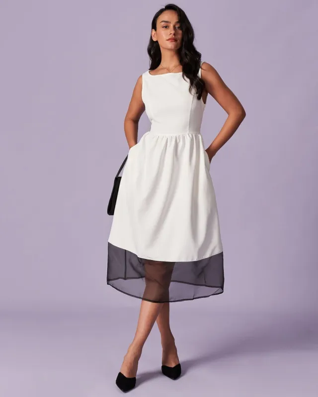 The White Round Neck Spliced Mesh Midi Dress sold by rihoas