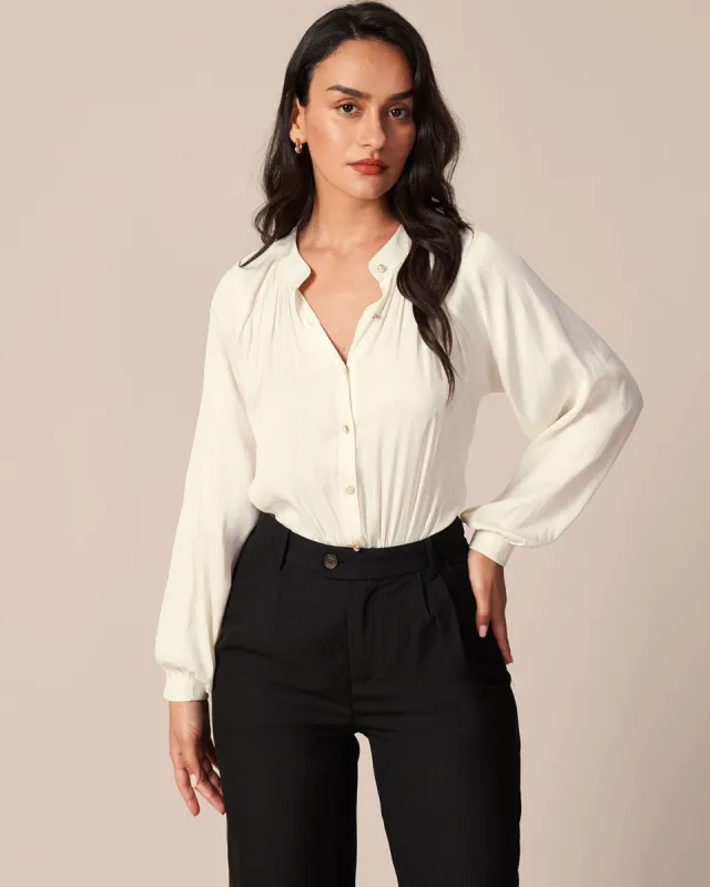 The Beige Mock Neck Lantern Sleeve Satin Shirt sold by rihoas