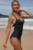 One Piece Black Swimsuit with Open Back sold by Zapaka