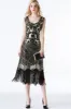 Sparkly Black Golden Fringed Flapper Dress sold by Zapaka