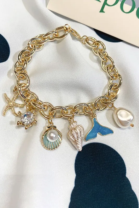 Sea Shell and Fish Tail Shaped Pendant Chain Bracelet sold by Zapaka