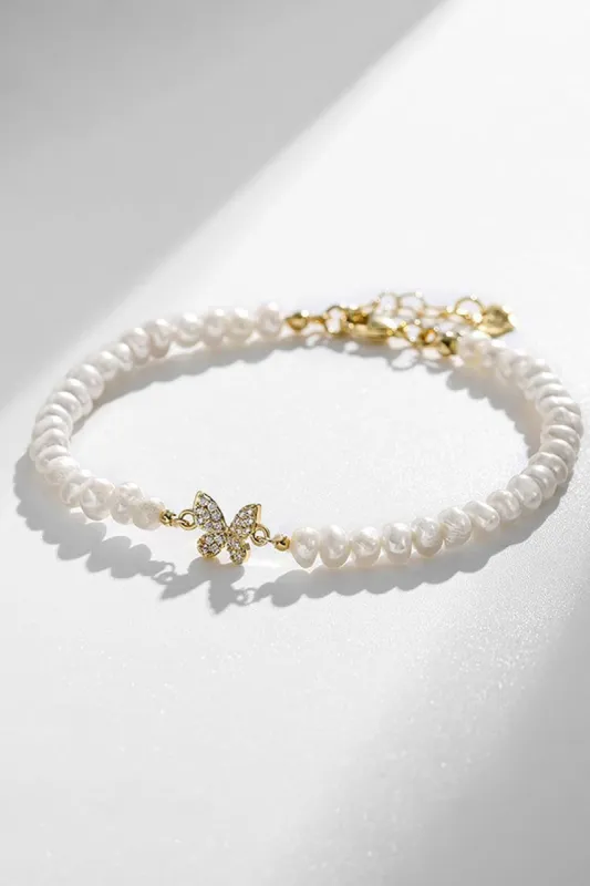 White Cultured Freshwater Full Pearl Bracelet with Rhinestone Butterfly sold by Zapaka