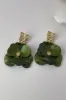 Green Acrylic Flower Shape Earrings sold by Zapaka