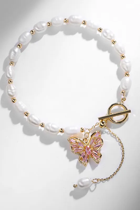 Elegant White Pearl and Butterfly Bracelet sold by Zapaka