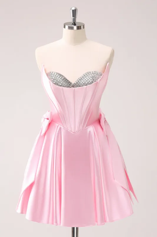 Pink A Line Strapless Corset Beaded Homecoming Dress with Bows sold by Zapaka
