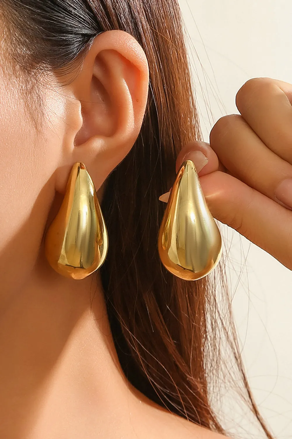 Simple Golden Metal Teardrop Earrings sold by Zapaka