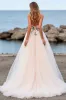 Blush A Line Tulle Boho Sweep Train Wedding Dress with Appliques sold by Zapaka