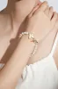 Sparkly White Pearl Stretch Bracelet with Butterfly sold by Zapaka