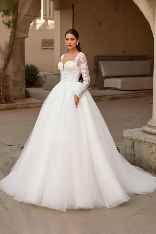 Ivory Long Sleeve Appliqued Sweep Train Wedding Dress sold by Zapaka