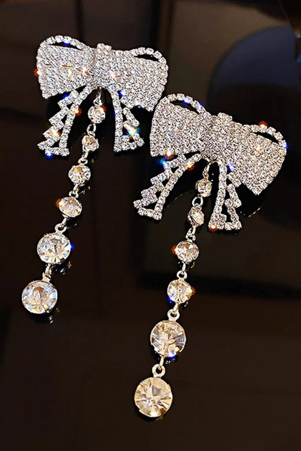 Sparkly Silver Bow Rhinestones Prom Drop Earrings sold by Zapaka