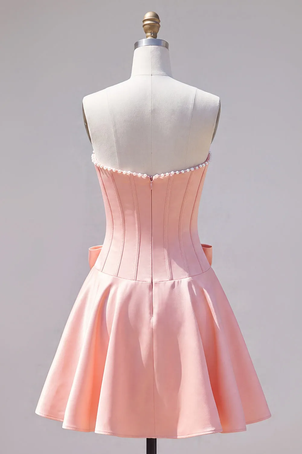 Peach Pink Satin Strapless Corset A-Line Pearls Homecoming Dress with Bow sold by Zapaka product image thumbnail 2