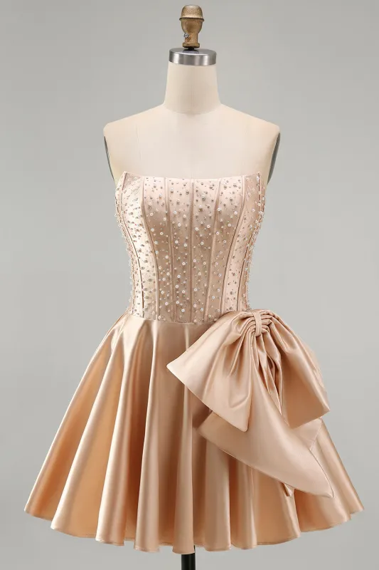 Champagne Corset Beaded Pearls A-Line Strapless Homecoming Dress with Bow made by Zapaka