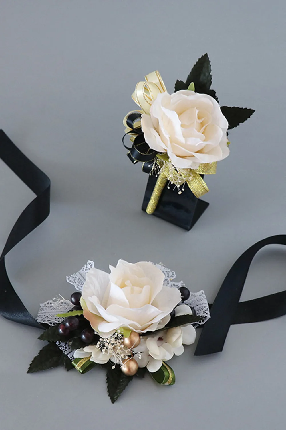 Luxury Black White Homecoming Wrist Corsage and Men's Boutonniere Set sold by Zapaka