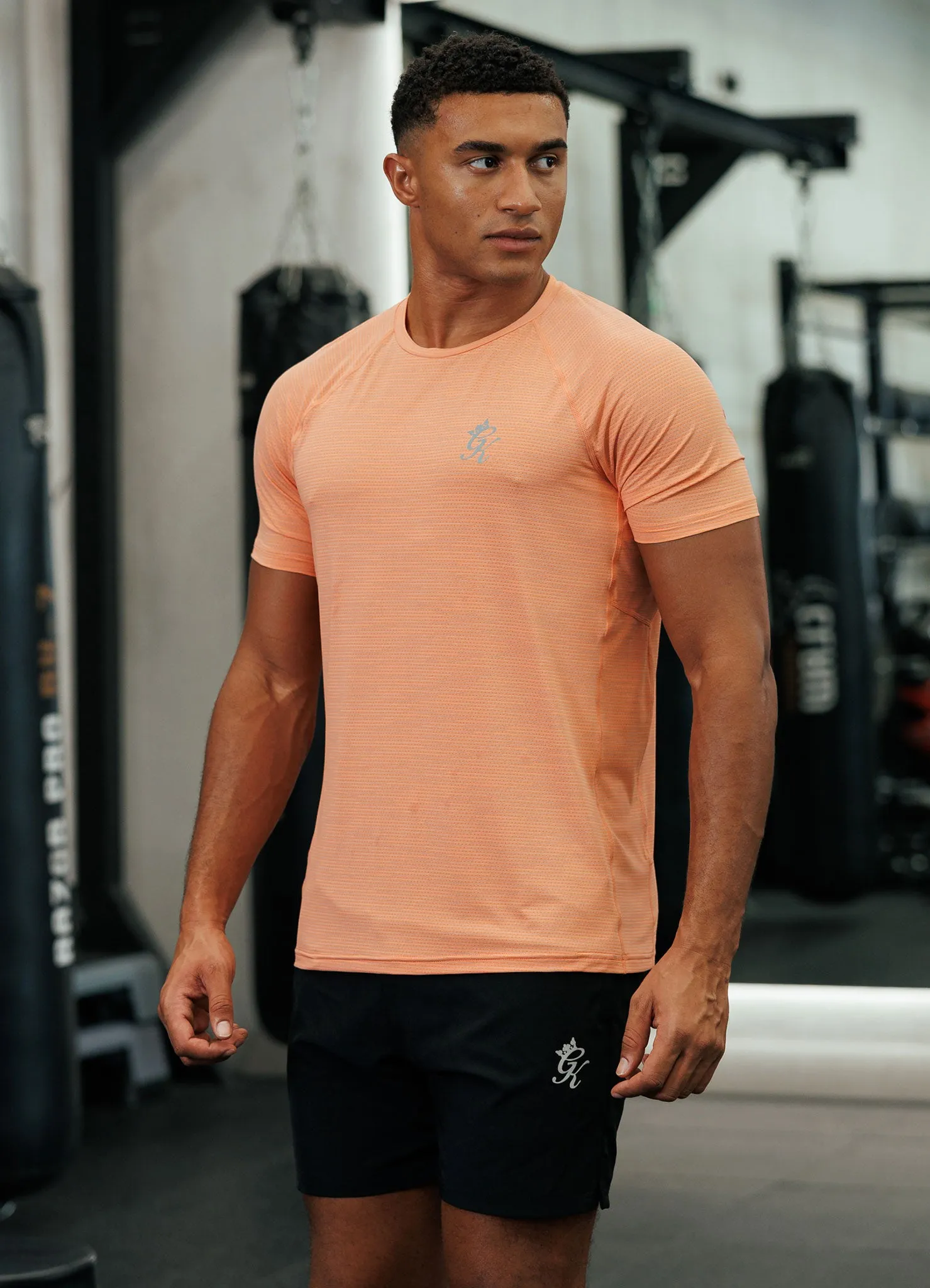 Gym King Energy Grindle Tee - Sunset Coral sold by The Gym King