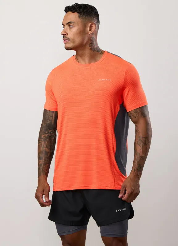Gym King Progress Performance Tee - Hot Orange/Graphite sold by The Gym King