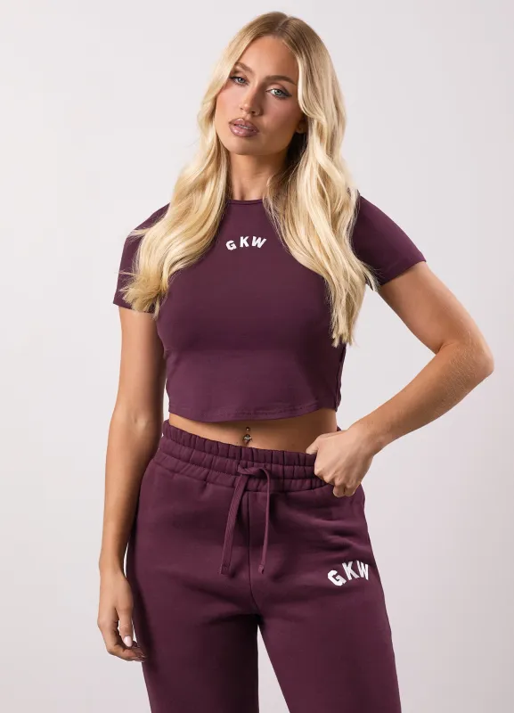 Gym King Inspire Cap Sleeve Curved Hem Tee - Vibrant Fig sold by The Gym King