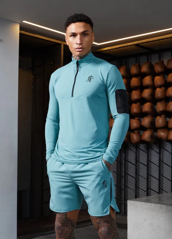 Gym King Flex ¼ Zip Funnel – Ocean Teal sold by The Gym King