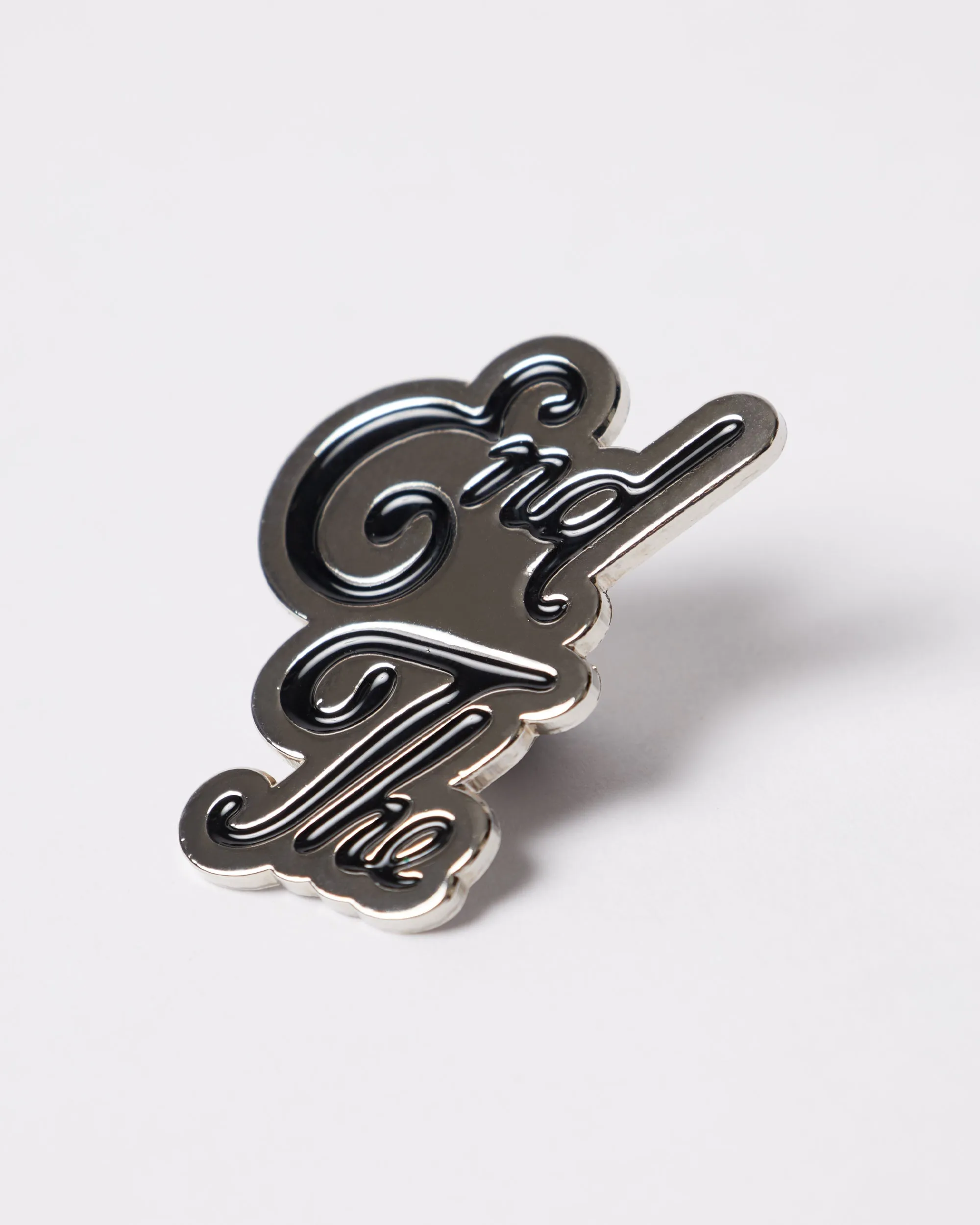 End the enamel pin sold by by Parra