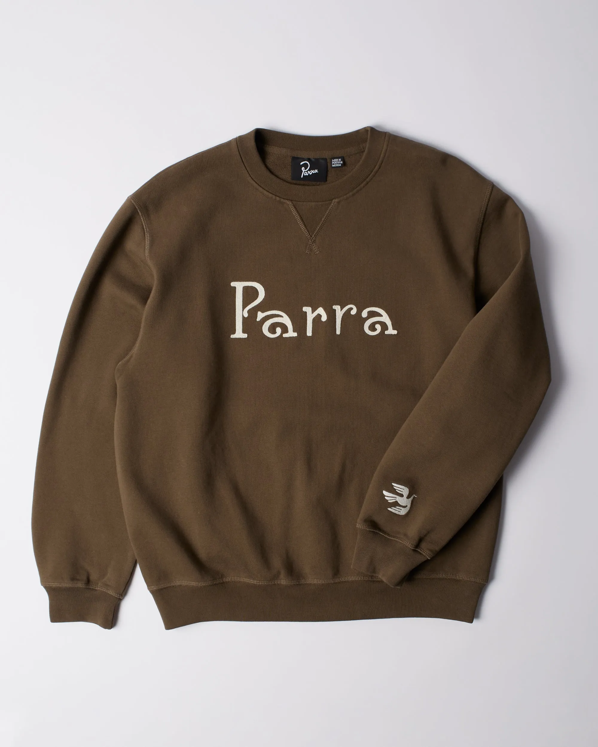Weird trad logo crew neck sweatshirt sold by by Parra