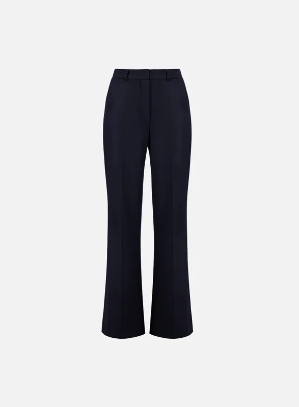 Flared fitted trousers superfine merino sold by Harris Wharf London